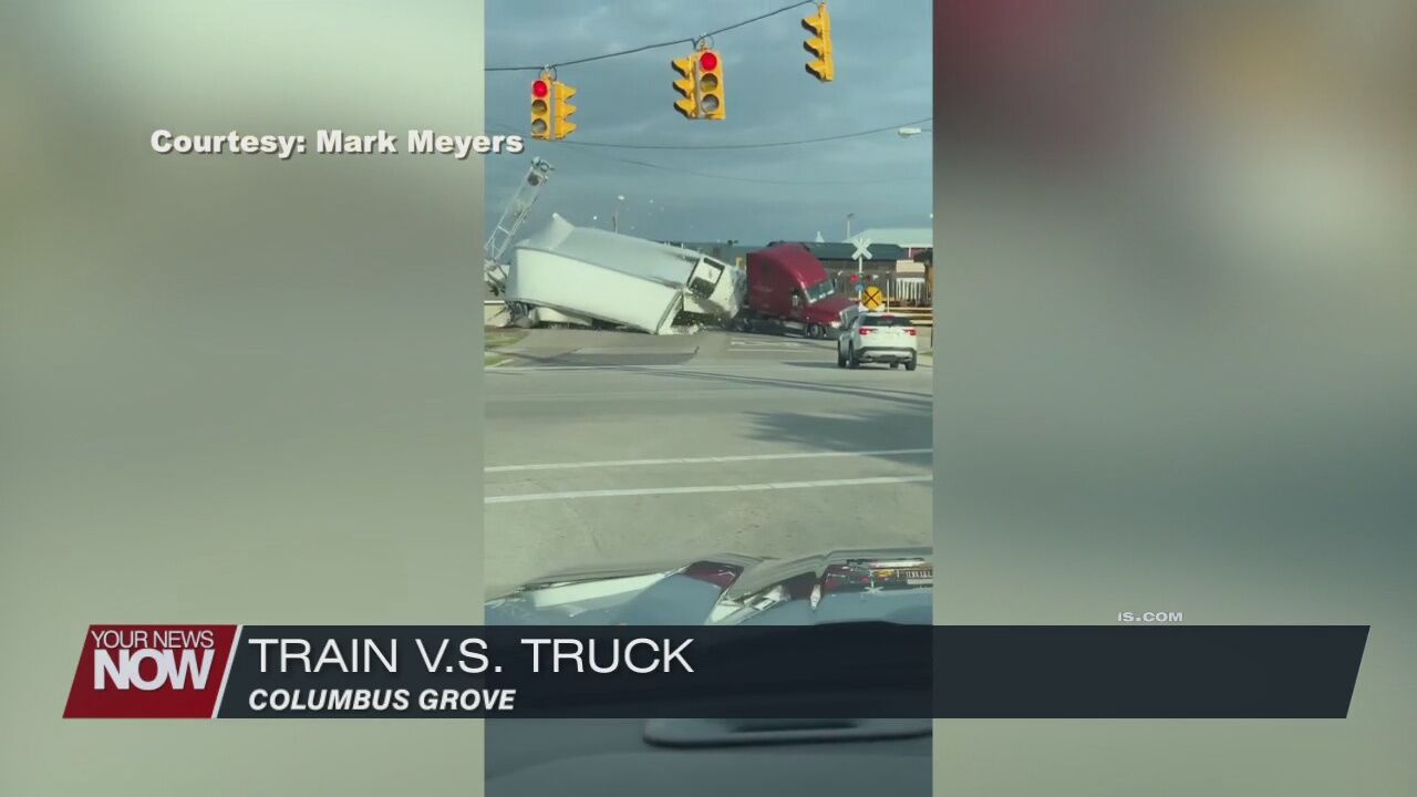 Train plows into semi, no one injured